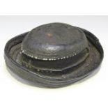 A rare 19th century Billingsgate market porter's bobbin hat, formed from thick black covered