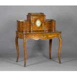 A mid-19th century Louis XV style kingwood bonheur-du-jour with rosewood banding of interwoven