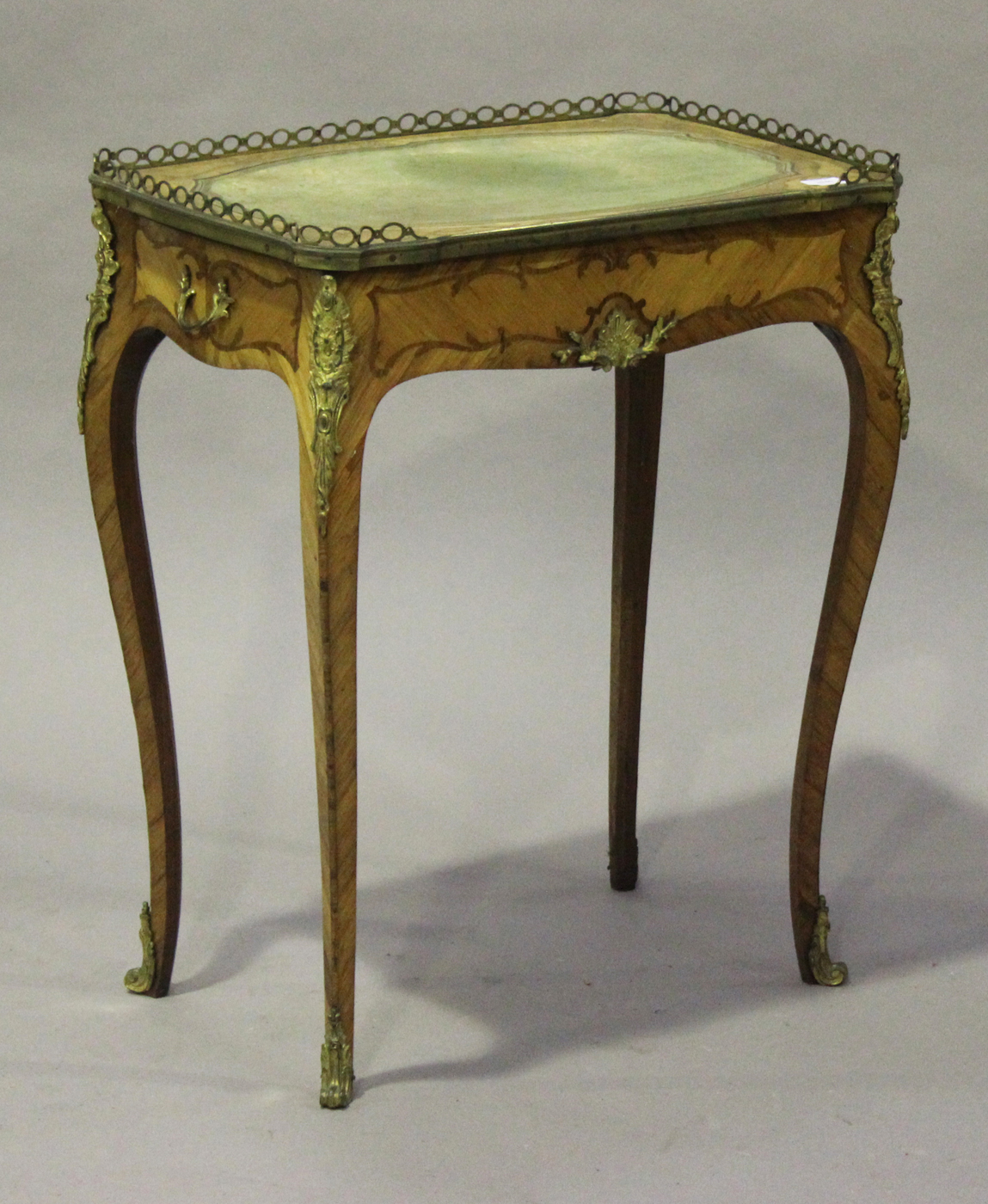 A late 19th century Louis XV style kingwood rectangular side table with gilt metal gallery and