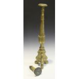 A 19th century Continental giltwood pricket candlestick, the fluted and flower cusp stem on three