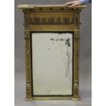 A 19th century gilt framed pier mirror, the inverted breakfront pediment above a foliate scroll