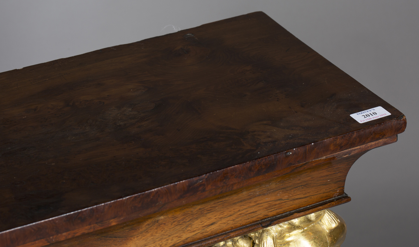 A Regency rosewood console table, the later veneered yew top supported by a pair of giltwood and - Image 2 of 5