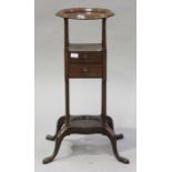 A George III mahogany gentleman's washstand, fitted with two drawers and raised on cabriole legs,