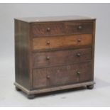 A mid-20th century oak chest of two short and three long drawers, on turned bun feet, height 91cm,