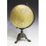 An early 20th century 'Philips' 12 inch Terrestrial Globe', raised on a cast iron foliate base