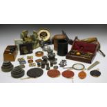 A group of mixed collectors' items, including a horn flask, a cast bronze model of a crown,