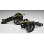 A pair of 19th century bronze signalling cannons, barrel length 18.5cm, each with ring turned and