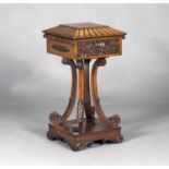 A Regency period rosewood teapoy, possibly Colonial, the lobed hinged lid enclosing four removable