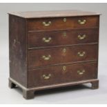 A George III provincial oak chest of four graduated long drawers, on bracket feet, height 100cm,