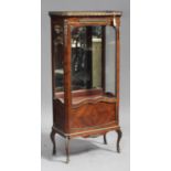 A late 19th century French kingwood and gilt metal mounted vitrine, the galleried top above a glazed