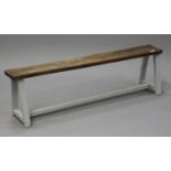 A late 19th century stained and grey painted bench, raised on splayed block legs, height 41.5cm,