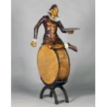 A late 19th century Italian carved and painted softwood figural dumb waiter, modelled in the form of