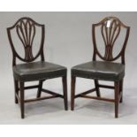 A set of six 19th century mahogany dining chairs with pierced splat backs, the seats overstuffed