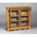 A mid-Victorian burr walnut two door pier cabinet with inlaid decoration and gilt metal mounts,