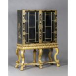 An early/mid-20th century black chinoiserie and gilt decorated display cabinet by Howard & Sons Ltd,