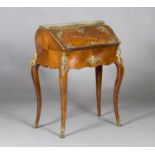 A late 19th century French Louis XV style parquetry kingwood lady's bureau with overall applied gilt