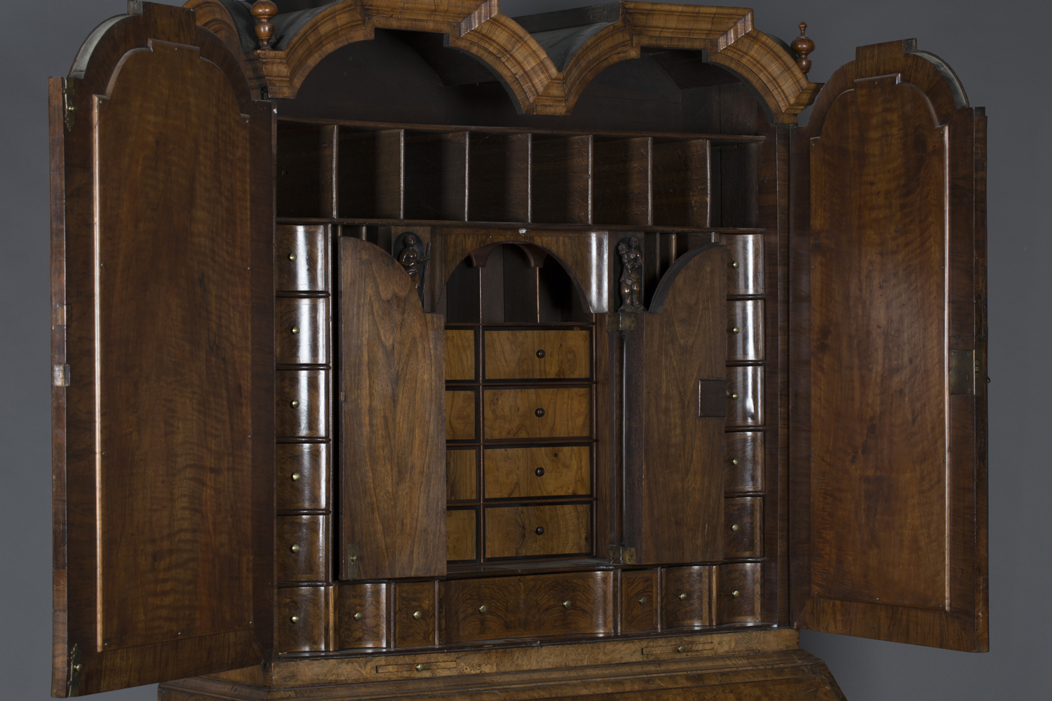 A Queen Anne and later walnut bureau bookcase, the double dome pediment fitted with two turned - Image 2 of 3