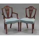 A late 20th century George III style reproduction mahogany dining room suite by William Tillman,