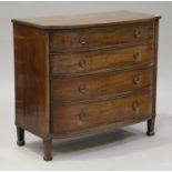 A George IV mahogany and ebony line inlaid break bowfront chest of four graduated long drawers