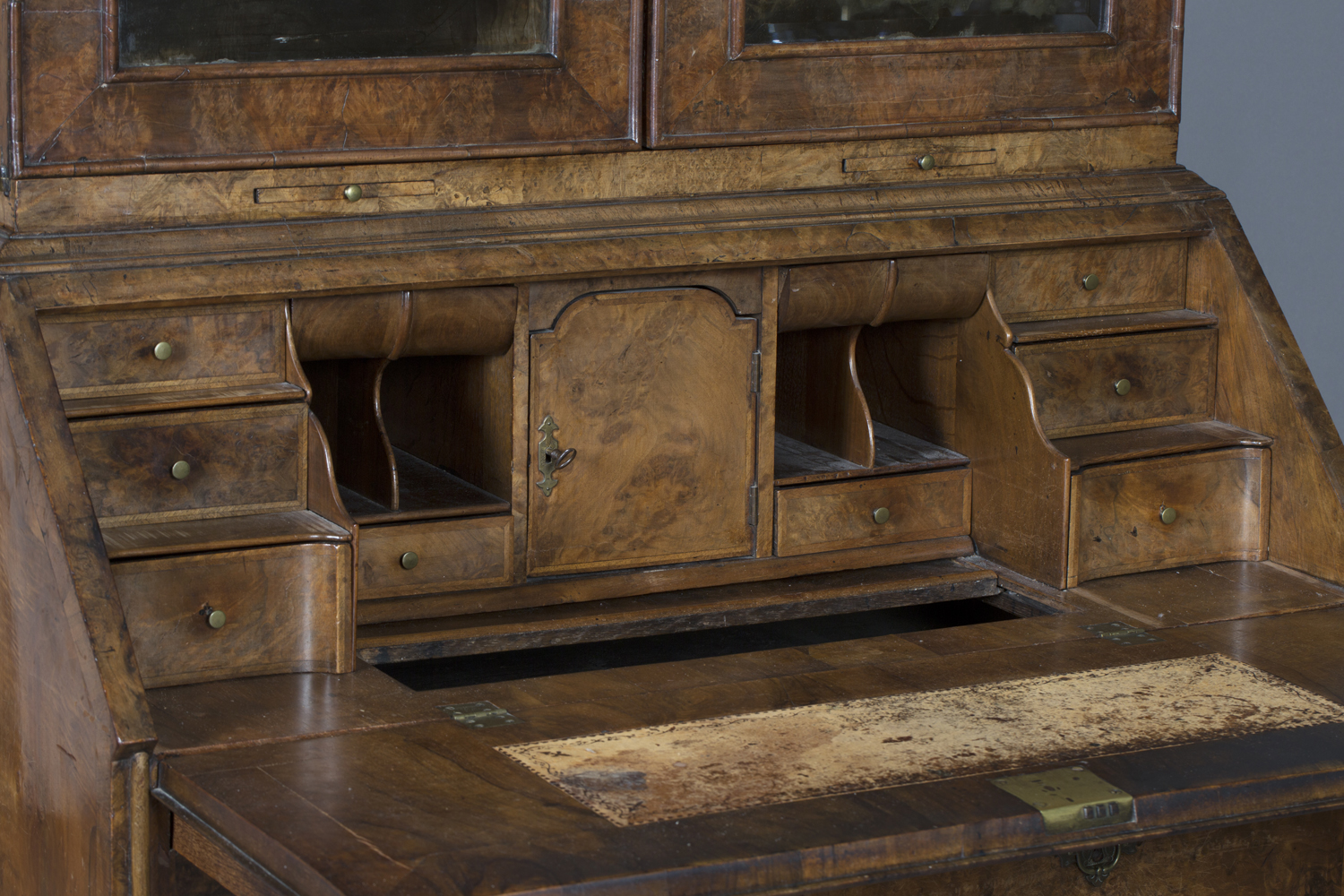 A Queen Anne and later walnut bureau bookcase, the double dome pediment fitted with two turned - Image 3 of 3