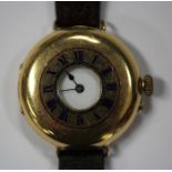 An 18ct gold half-hunting cased lady's wristwatch, with an unsigned jewelled lever movement, 18ct