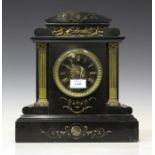 A late 19th century black slate and brass mounted mantel clock with eight day movement, the case
