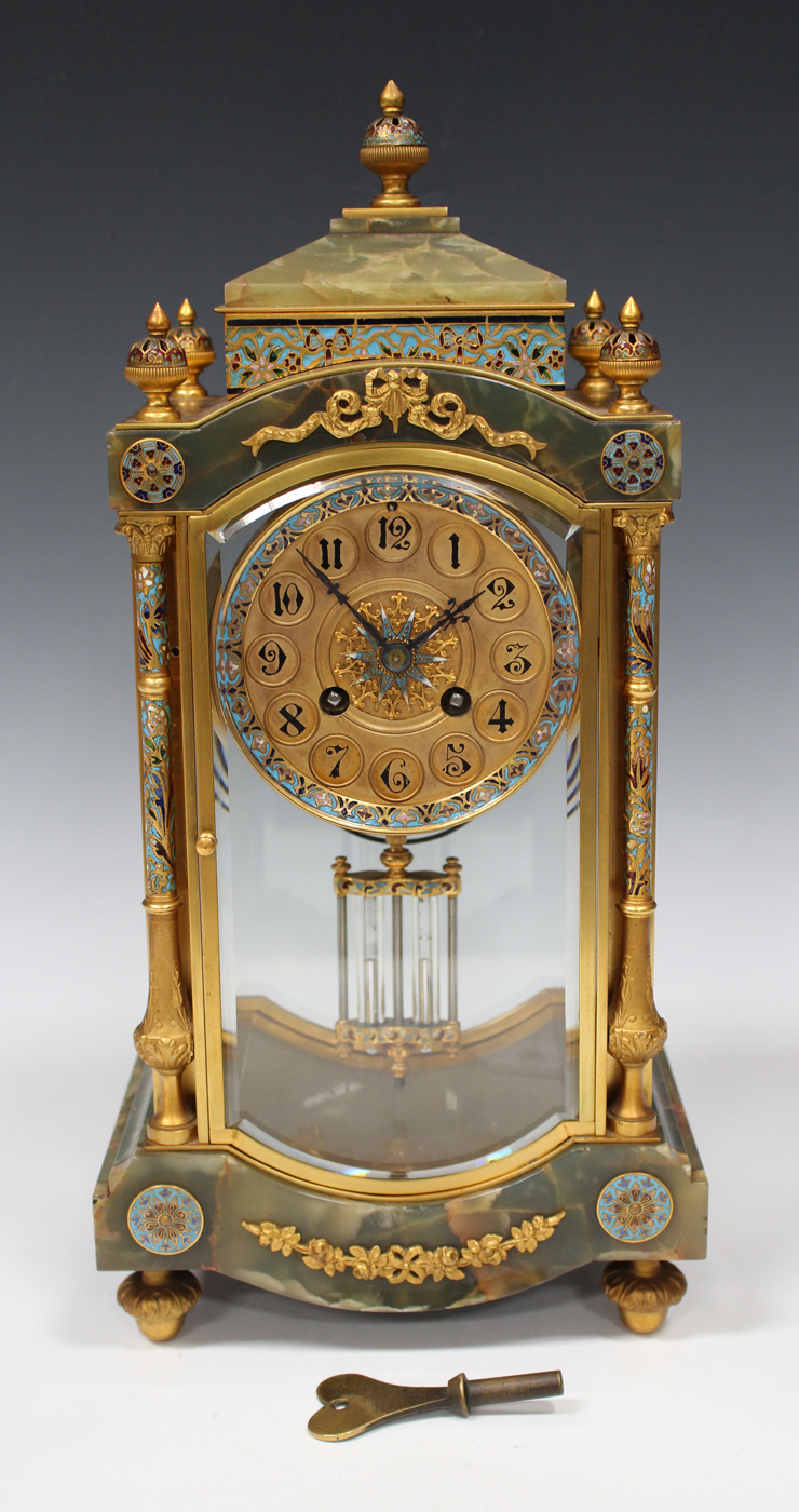 A late 19th century French gilt brass, champlevé enamel and onyx four glass mantel clock with - Image 6 of 6