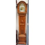 A George V oak diminutive longcase clock with eight day movement chiming with a choice of