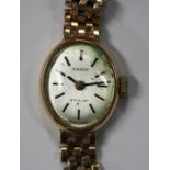 A Tissot Stylist 9ct gold oval cased lady's wristwatch, the signed jewelled movement numbered '