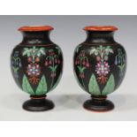 A pair of Aesthetic porcelain vases, late 19th century, each decorated in the manner of Dr