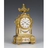 A late 19th century French ormolu and white marble mantel clock with eight day movement striking