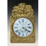 A 19th century French Comtoise or Morbier brass cased wall clock with eight day movement striking on