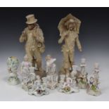 A pair of Continental buff terracotta figures, late 19th century, probably Austrian, modelled as Don