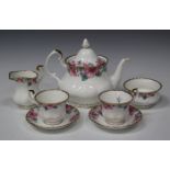 A Royal Albert bone china Lydia pattern part service, including teapot and cover, five teacups and