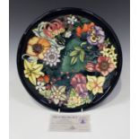 A Moorcroft pottery limited edition charger, circa 1996, designed by Rachel Bishop, No. 370,