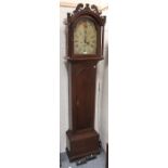 An early 19th century oak longcase clock with eight day movement striking on a bell, the painted