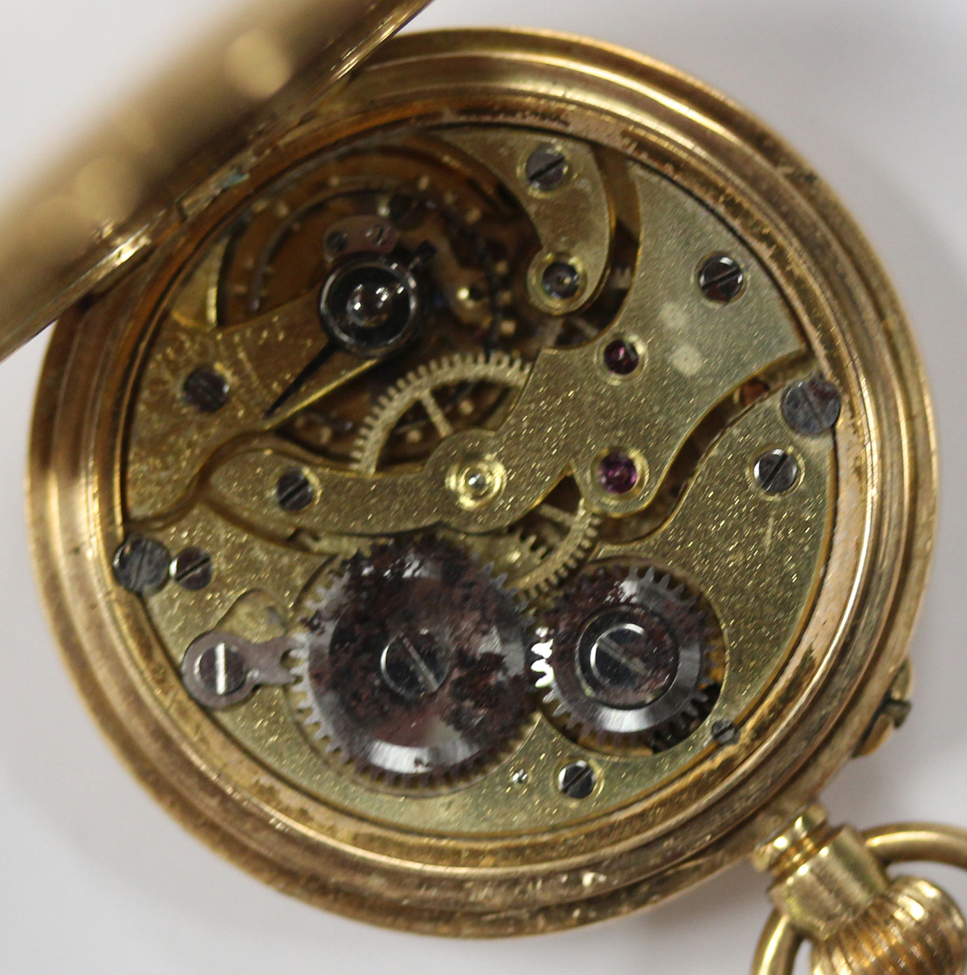 An 18ct gold keyless wind half-hunting cased lady's fob watch, with a gilt jewelled movement, 18ct - Image 5 of 6