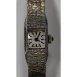 A Rotary 9ct white gold lady's bracelet wristwatch, the signed square dial with black baton