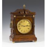 An early 20th century pollard oak bracket clock with eight day twin fusee movement striking quarters