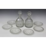 A pair of cut glass decanters and stoppers, late 19th century, together with a group of similar