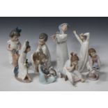 Eleven Lladro porcelain figures, including Little Sleepwalker, No. 6482, Nothing To Do, No. 5649,