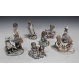 Five Lladro porcelain figures, comprising New Playmates, No. 5456, Sleepy Kitten, No. 5712, Boy with