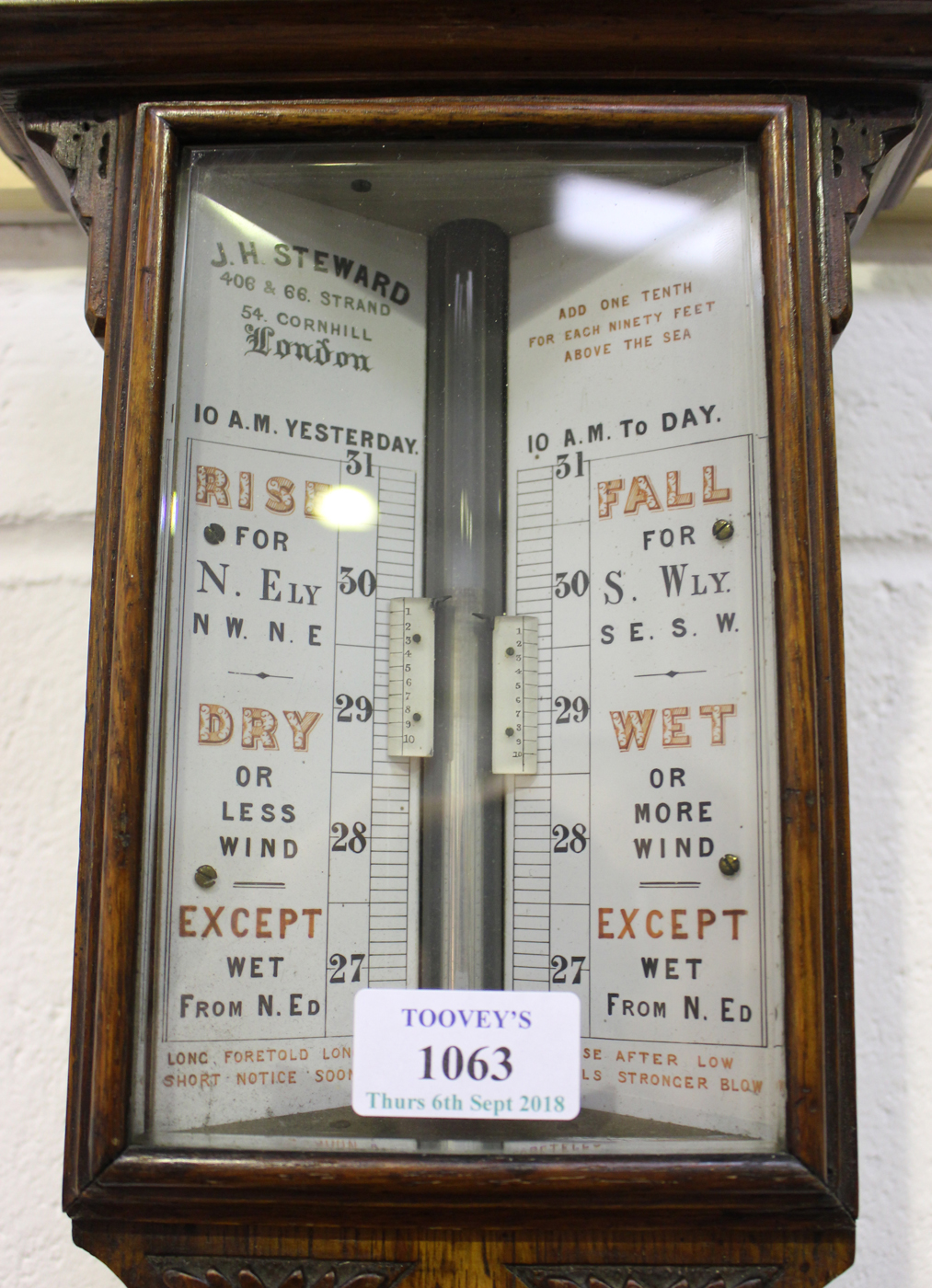 A late Victorian oak cased stick barometer with mercury thermometer, the dial with vernier scales - Image 3 of 3