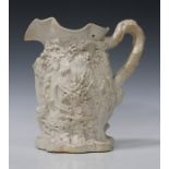 A stoneware Yeovil Riot jug, early 19th century, the body moulded in relief with fruiting vines