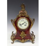 A late 19th century French gilt brass and tortoiseshell mounted mantel clock with eight day movement