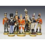 A set of seven Rudolstadt Volkstedt porcelain figures, mid-20th century, each modelled wearing