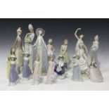 Three Lladro porcelain figures of ladies, comprising Afternoon Tea, No. 1428, Woman, No. 4761, and