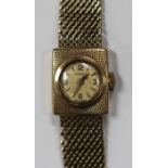 A Longines 9ct gold rectangular cased lady's bracelet wristwatch, with a signed jewelled movement,