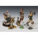 A large collection of Capodimonte porcelain figures, 20th century, including a hunter and his dog, a