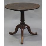 A George III mahogany tip-top wine table, on a turned column and tripod cabriole legs, height